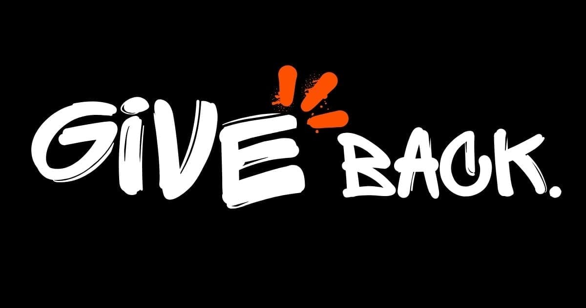 give back White "Give Back" graffiti lettering with orange accents on black